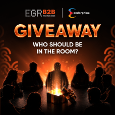 Endorphina EGR B2B Awards 2026 ticket giveaway featuring industry professionals gathered around a glowing gift box at an iGaming networking event.