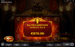 Minotaur ReBurn gameplay showing a €870 Buy Wild Minotaur option on reels 2, 3 or 4, with a golden Minotaur head above the selection panel.