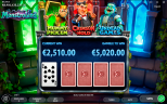 Monstroland slot gameplay by Endorphina showing the Risk Game with Dracula, Frankenstein’s monster, and the Mummy, a current win of €2,510, a potential doubled win of €5,020, and four face-down playing cards to choose from.