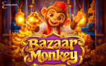 Bazaar Monkey slot by Endorphina showing the monkey character holding a glowing golden fruit, surrounded by piles of gold, with the Bazaar Monkey game title and Endorphina logo